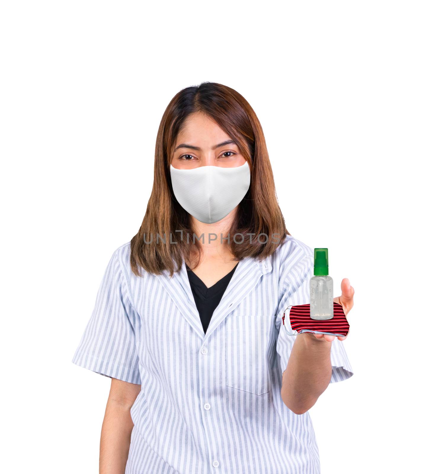 woman wearing fabric mask and product gel antibacterial antiseptic place on hand