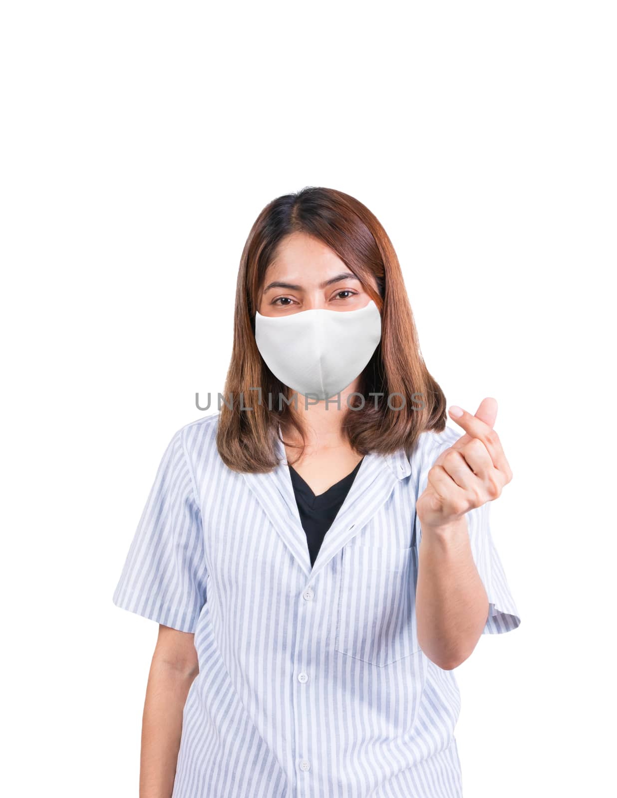 woman showing mini heart sign and wearing fabric mask safety by pramot