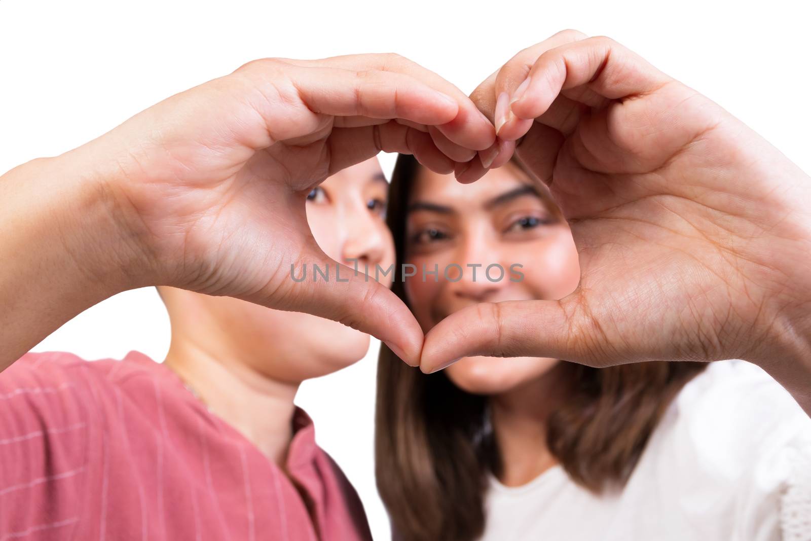 woman and tomboy romantic happy  in love gesturing heart by pramot