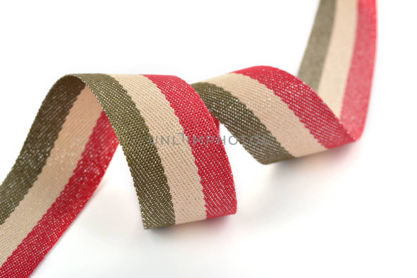 Red khaki green beige Cotton ribbon, strapping tape with curl on white backgroud. Use for sewing clothes, bags. Space for text.