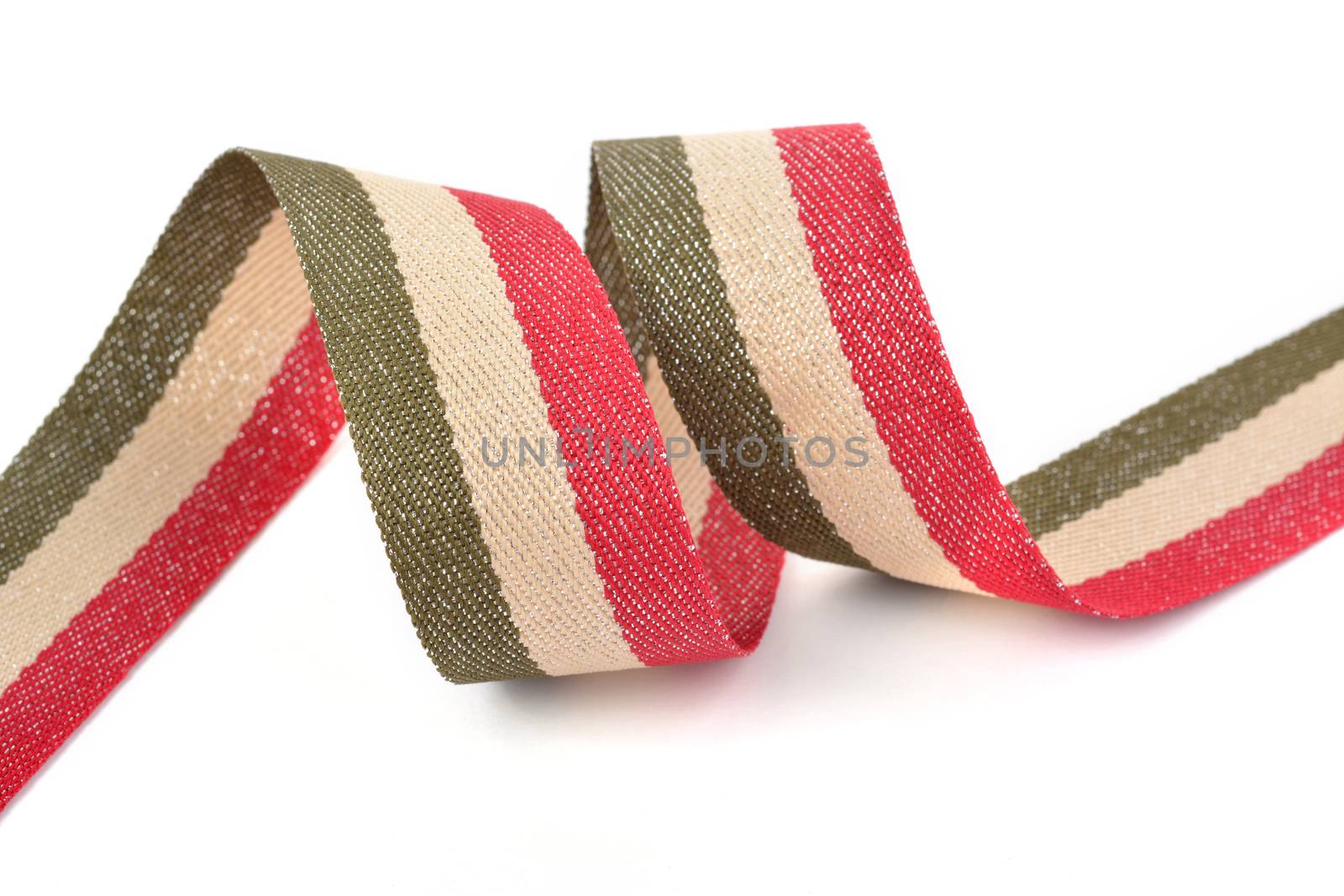 Red khaki green beige Cotton ribbon, strapping tape with curl on white backgroud. Use for sewing clothes, bags. Space for text.