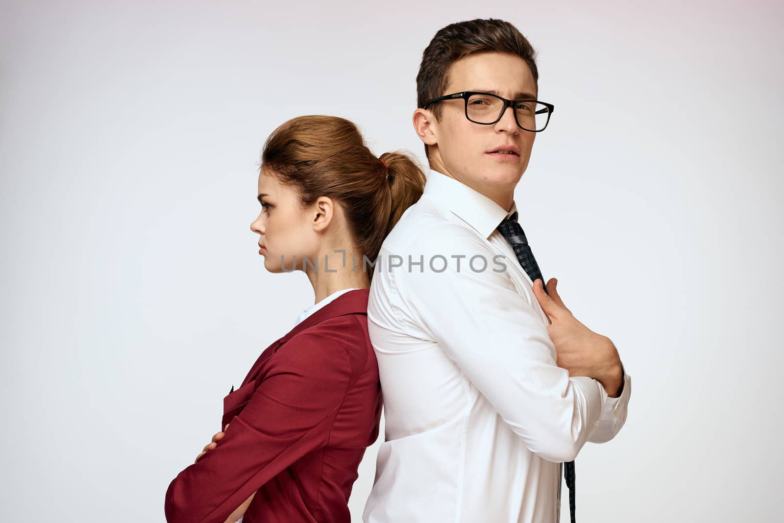 Work colleagues Business couple office officials team studio light background by SHOTPRIME