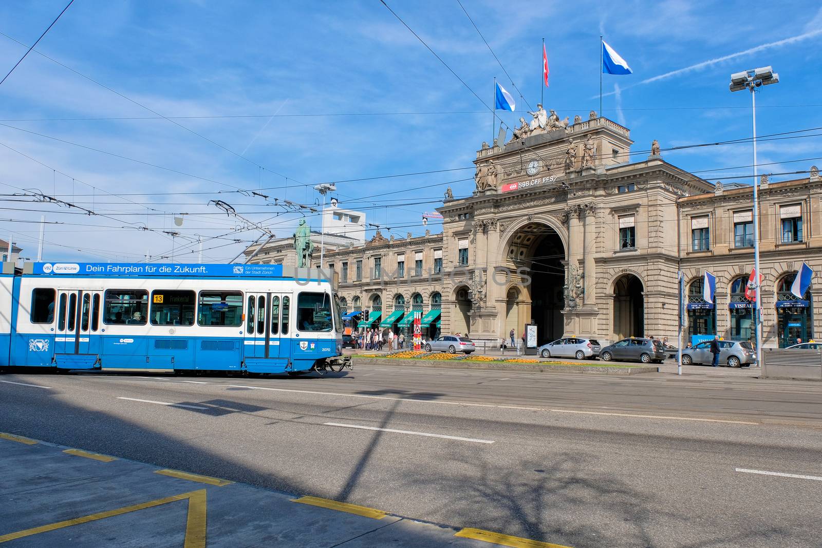 Zurich, Switzerland - 29 March : a tram passing along Bahnhofbrucke bridge in the city of Zurich. Trams make an important contribution to public transport of the city at 29 March 2017