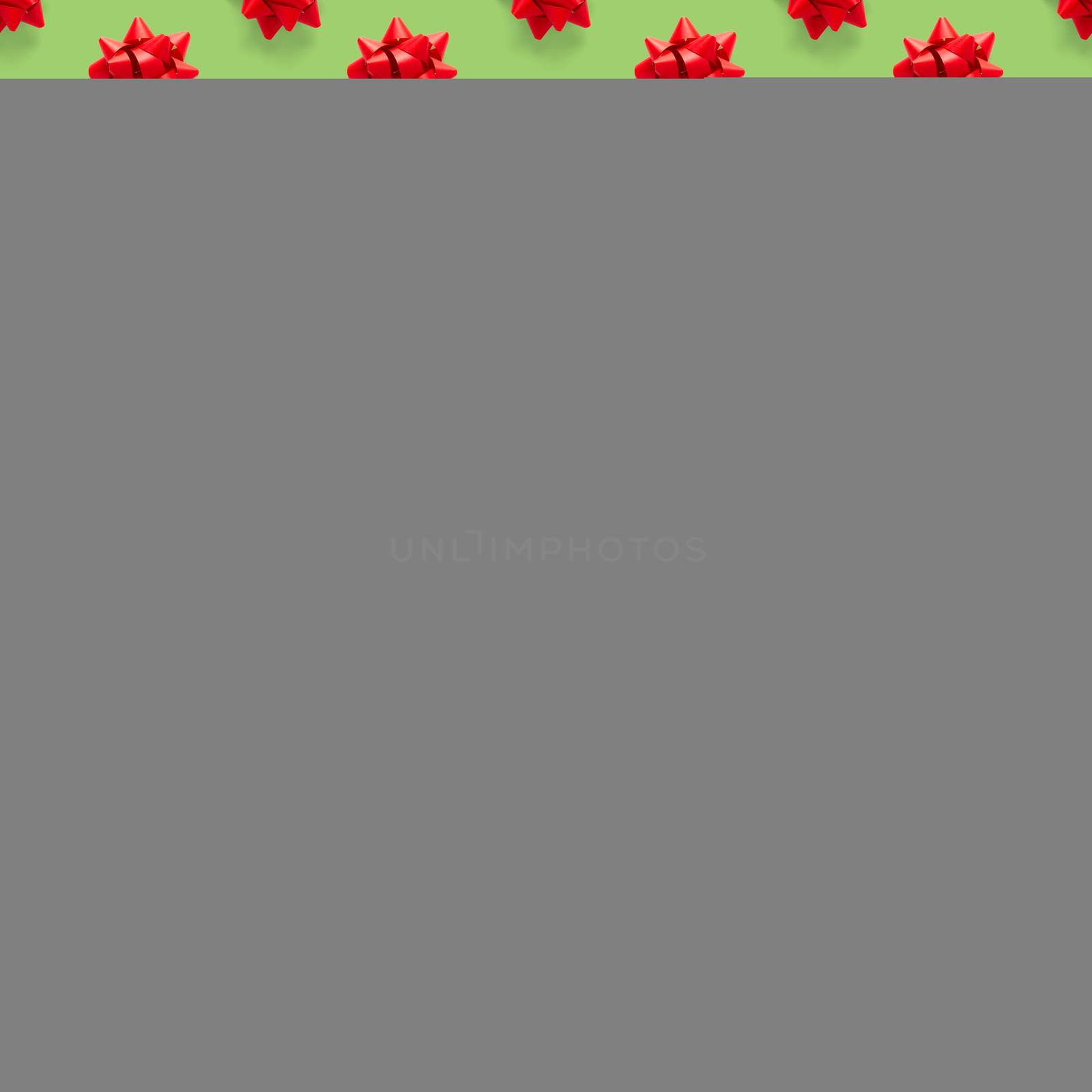 Seamless regular creative Christmas pattern with New Year decorations on green background. xmas Modern Seamless pattern made from christmas decorations. Photo quality pattern for fabric, prints, wallpapers, banners or creative design works.