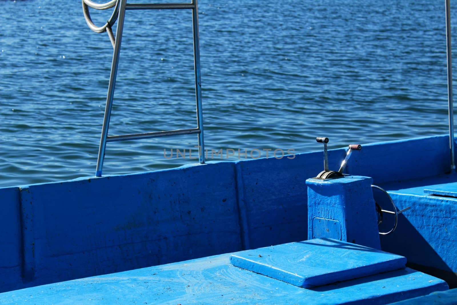Blue boat on the dock of Santa Pola, Spain by soniabonet