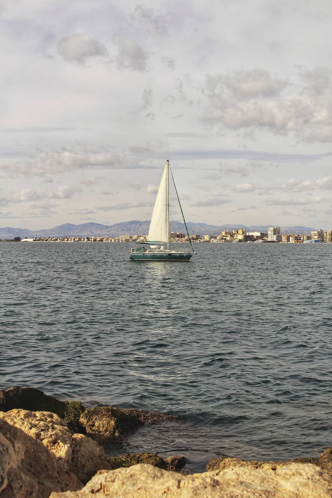 Sailboat entering the port by soniabonet