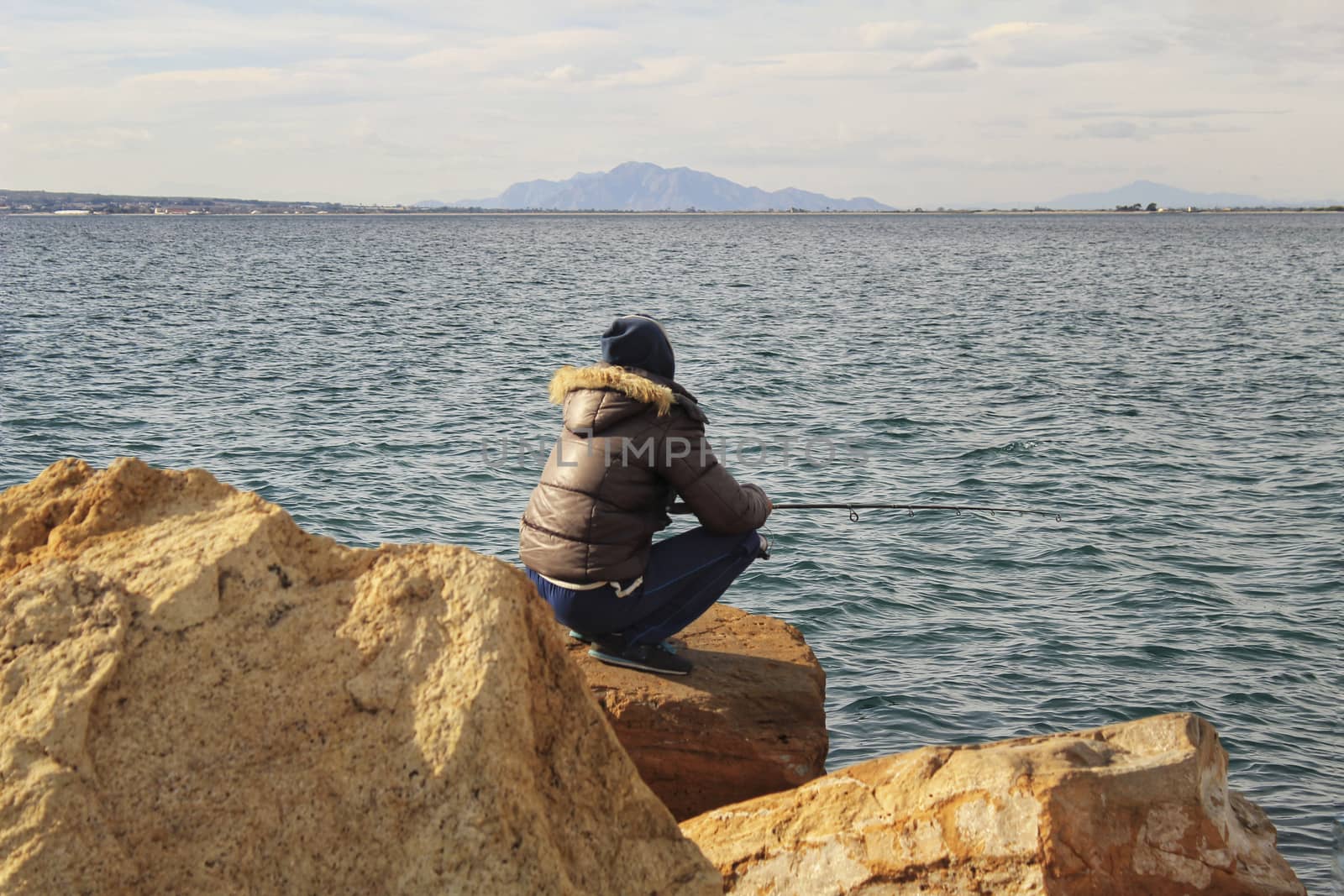 Fishing and relaxing in a sunny day in Santa Pola, Alicante