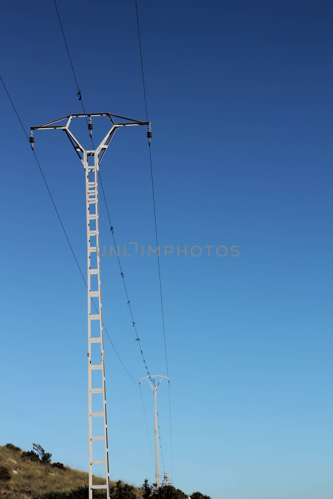 High voltage towers in the mountain