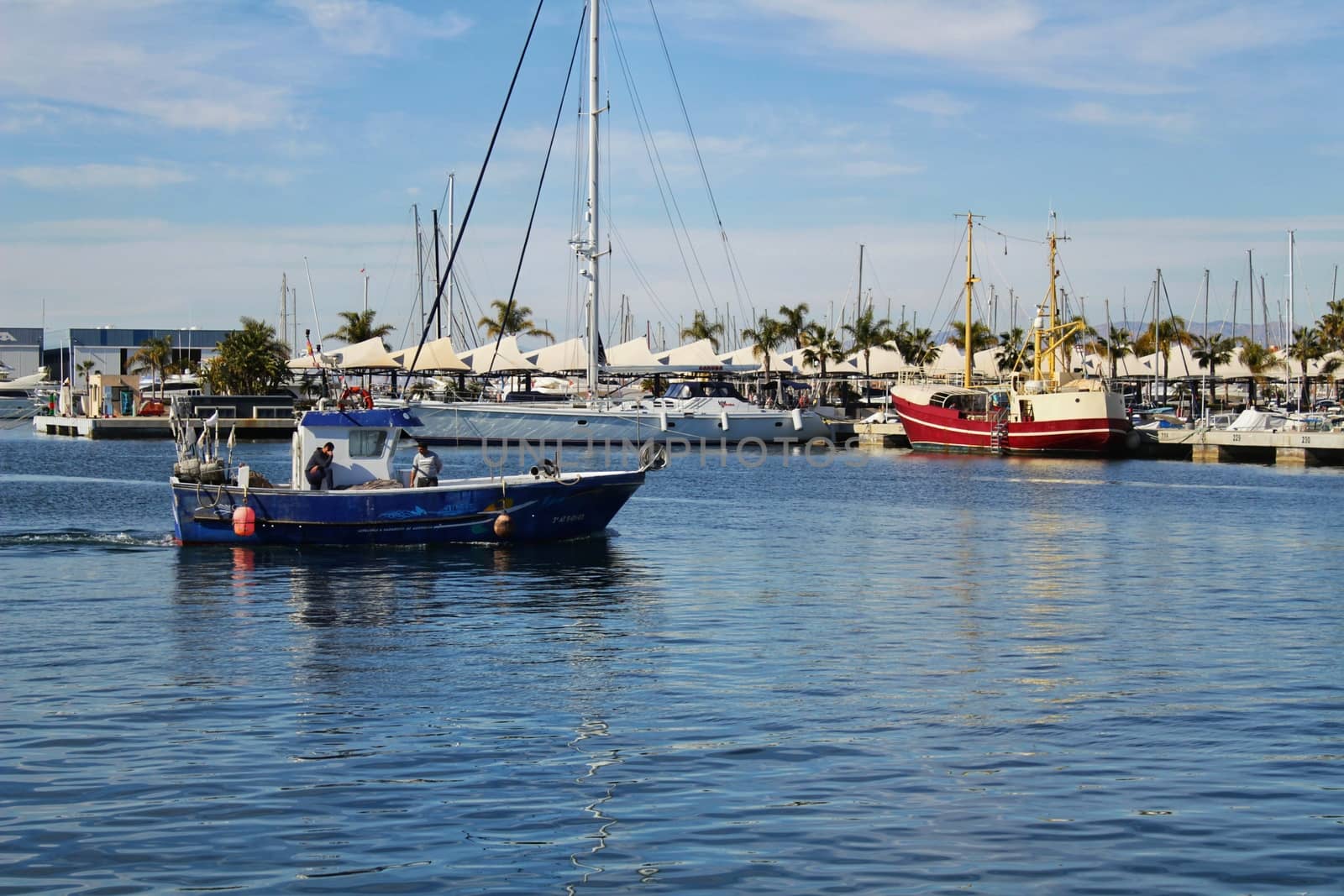 Fishing boat entering port in southern Spain