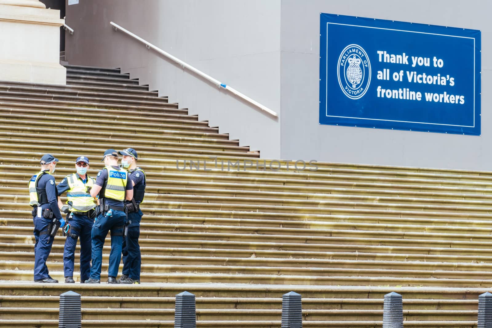 Melbourne, Australia - October 18, 2020: Victoria police patrol Melbourne CBD streets and Parliament, checking on people during the Coronavirus pandemic and associated lockdown.