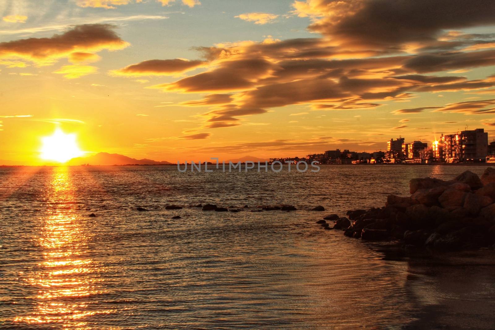 Colorful and Beautiful sky and sea at Sunset in Santa Pola, a small fishing village in southern Spain