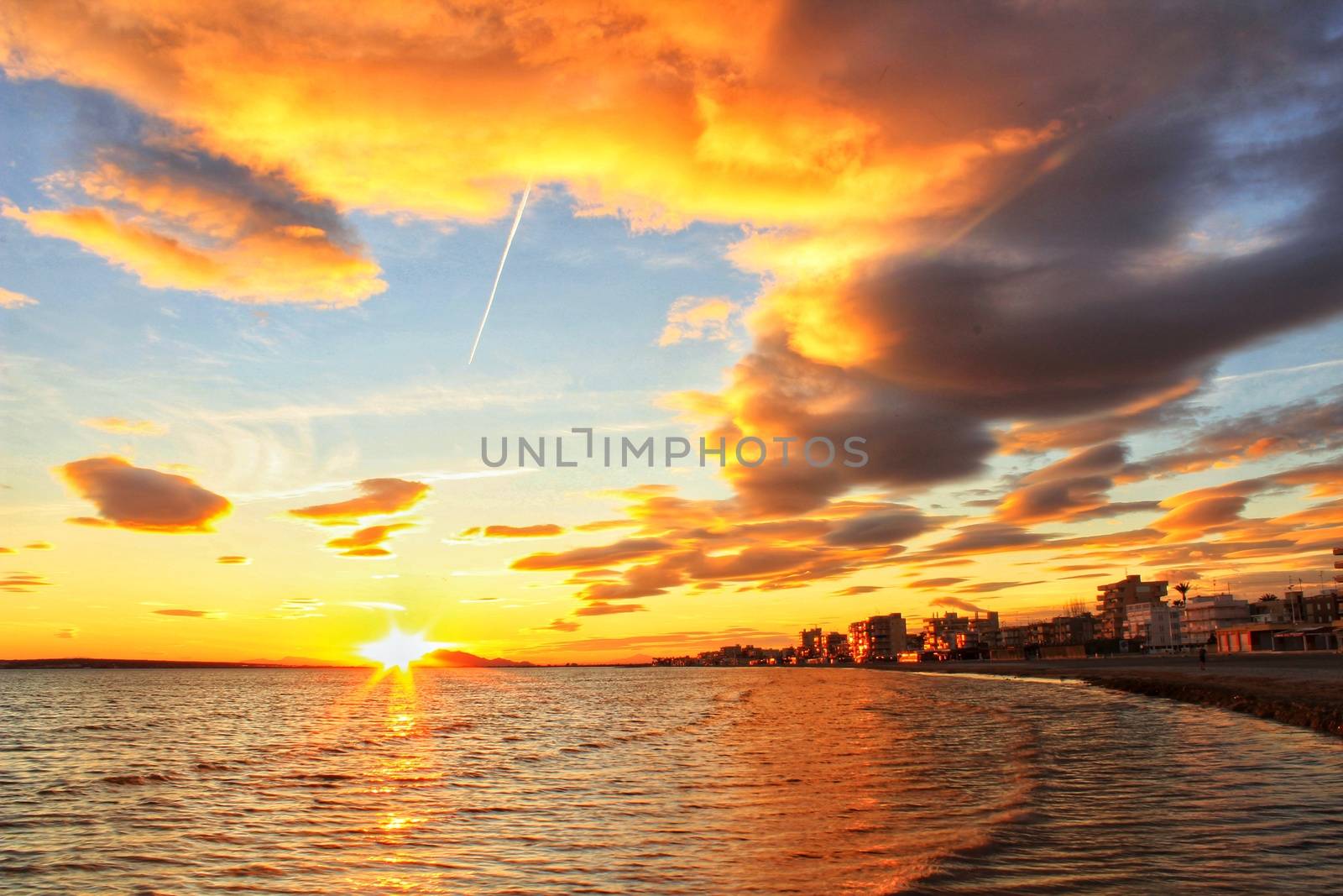 Colorful and Beautiful sky and sea at Sunset in Santa Pola, a small fishing village in southern Spain