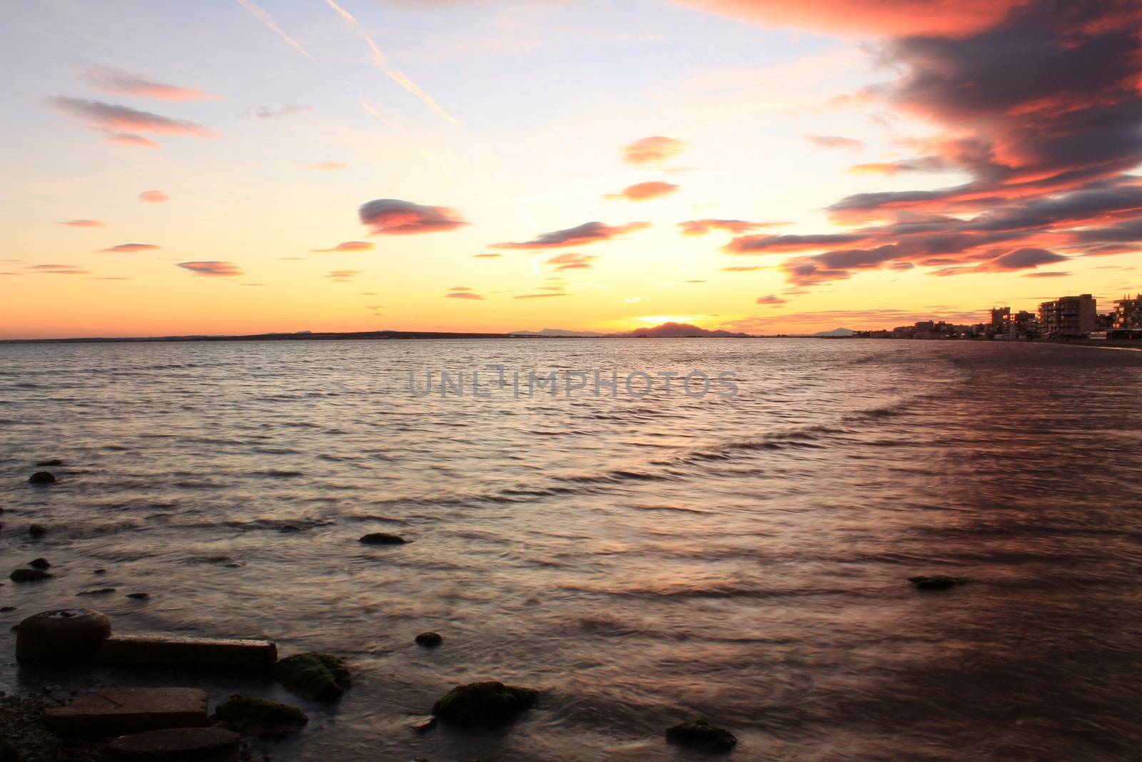 Colorful and Beautiful sky and sea at Sunset in Santa Pola, a small fishing village in southern Spain