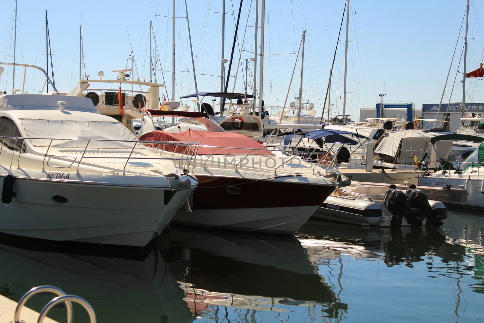 Santa Pola, Spain- 15 February, 2018: Recreational boats moored at the dock in the nautical club of Santa Pola in a sunny day