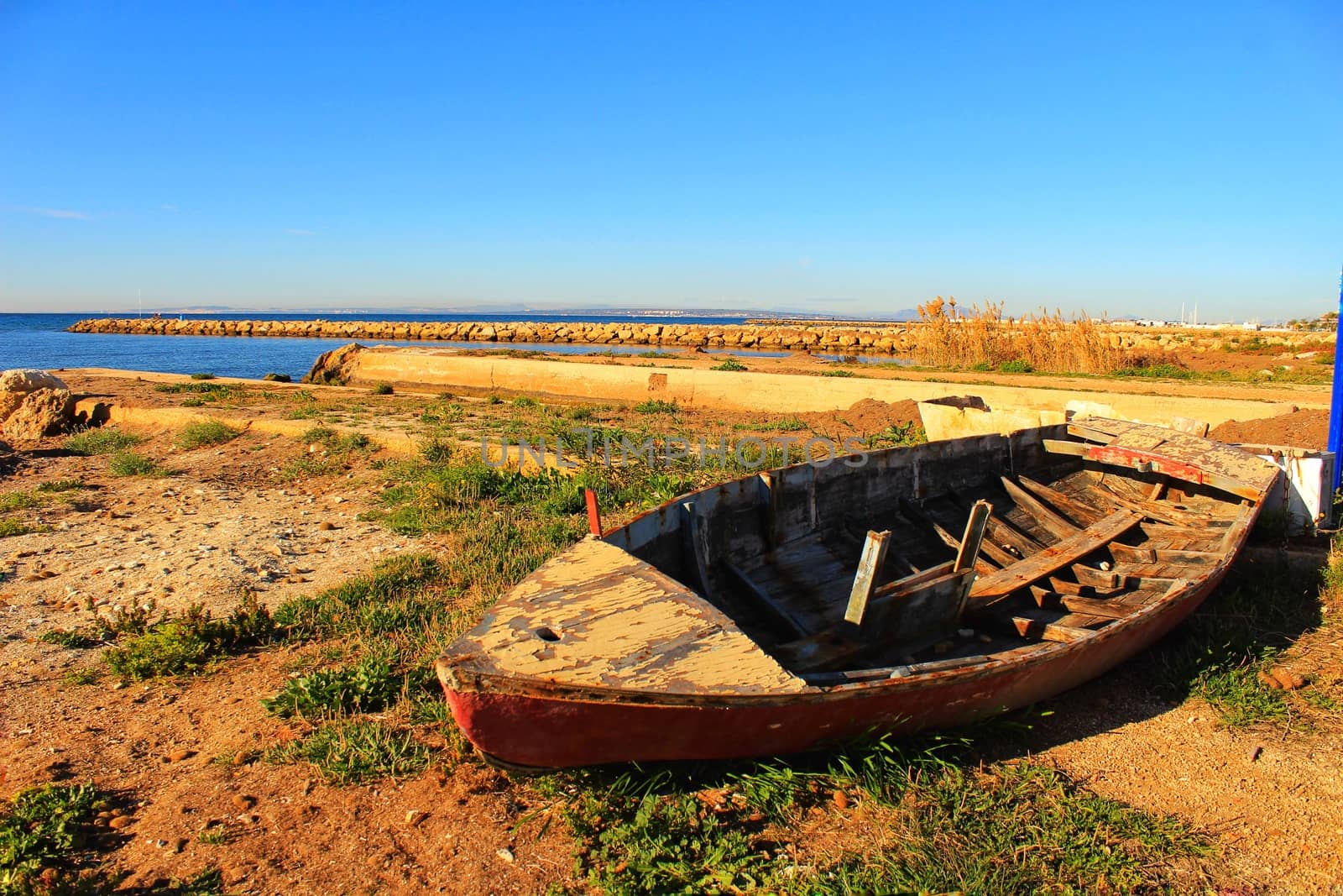Old abandoned boat on the beach