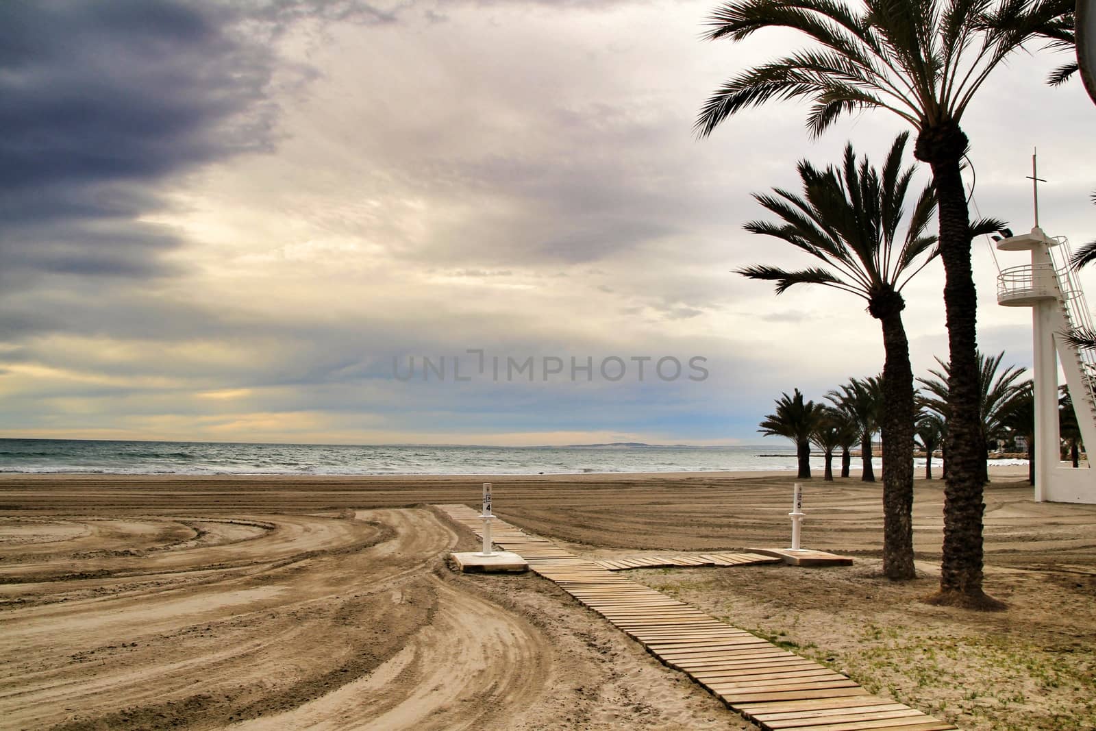 Beach under stormy sky in Santa Pola, Alicante, Spain