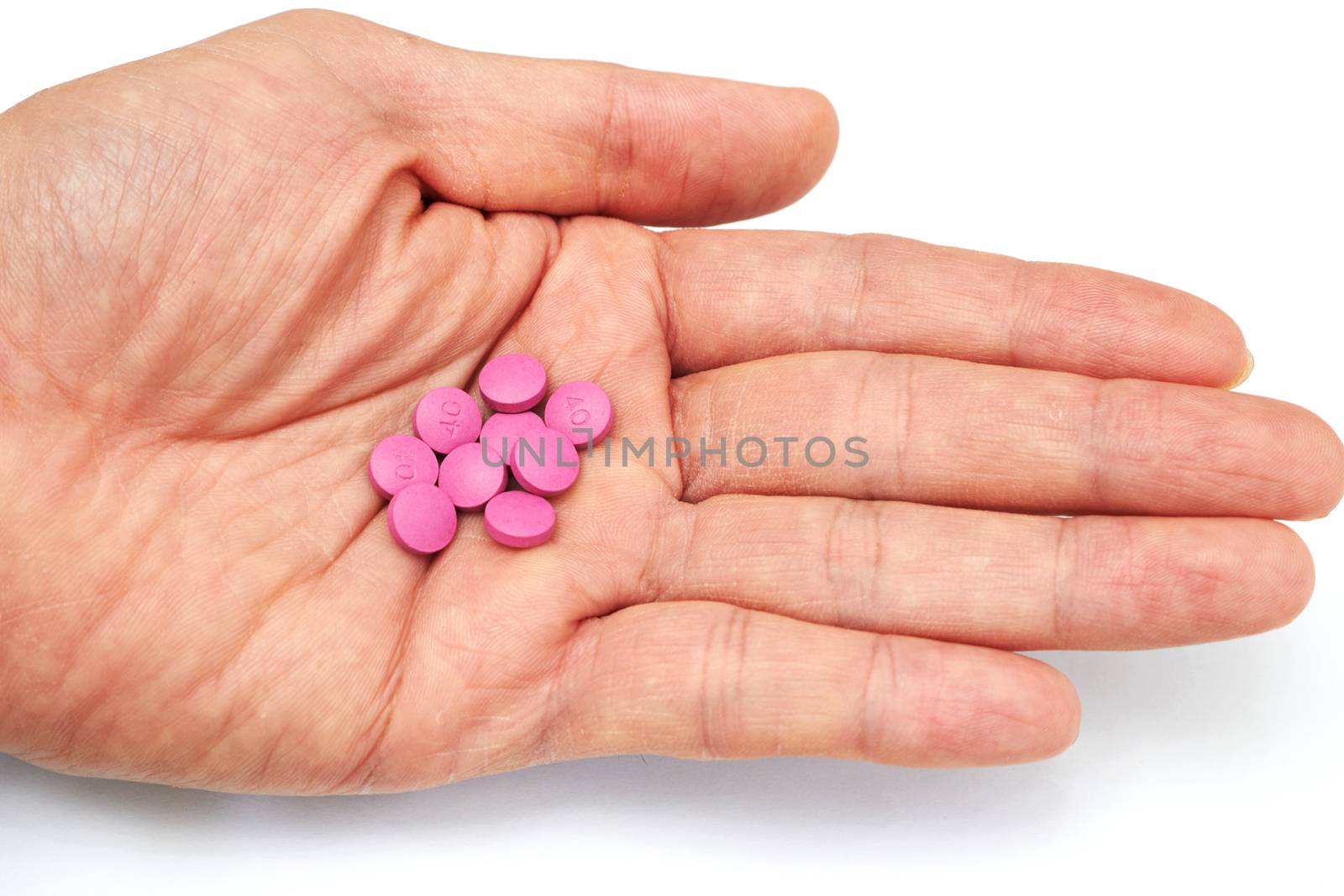 Hand holded medical pills before  oral take in medical healthcare consumption concept
