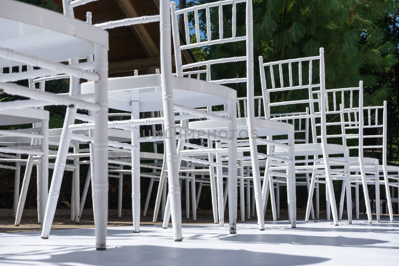 White wooden chairs. by Serhii_Voroshchuk
