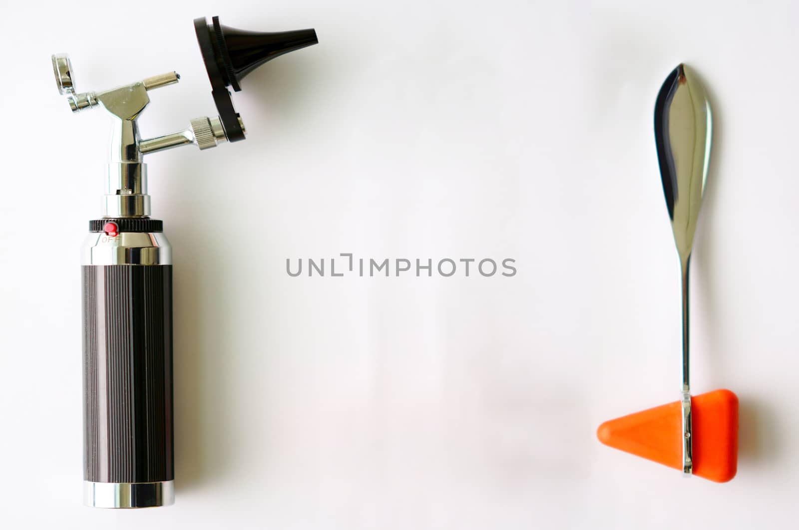Otoscope and hammer jerk on floor ,top view with copy space