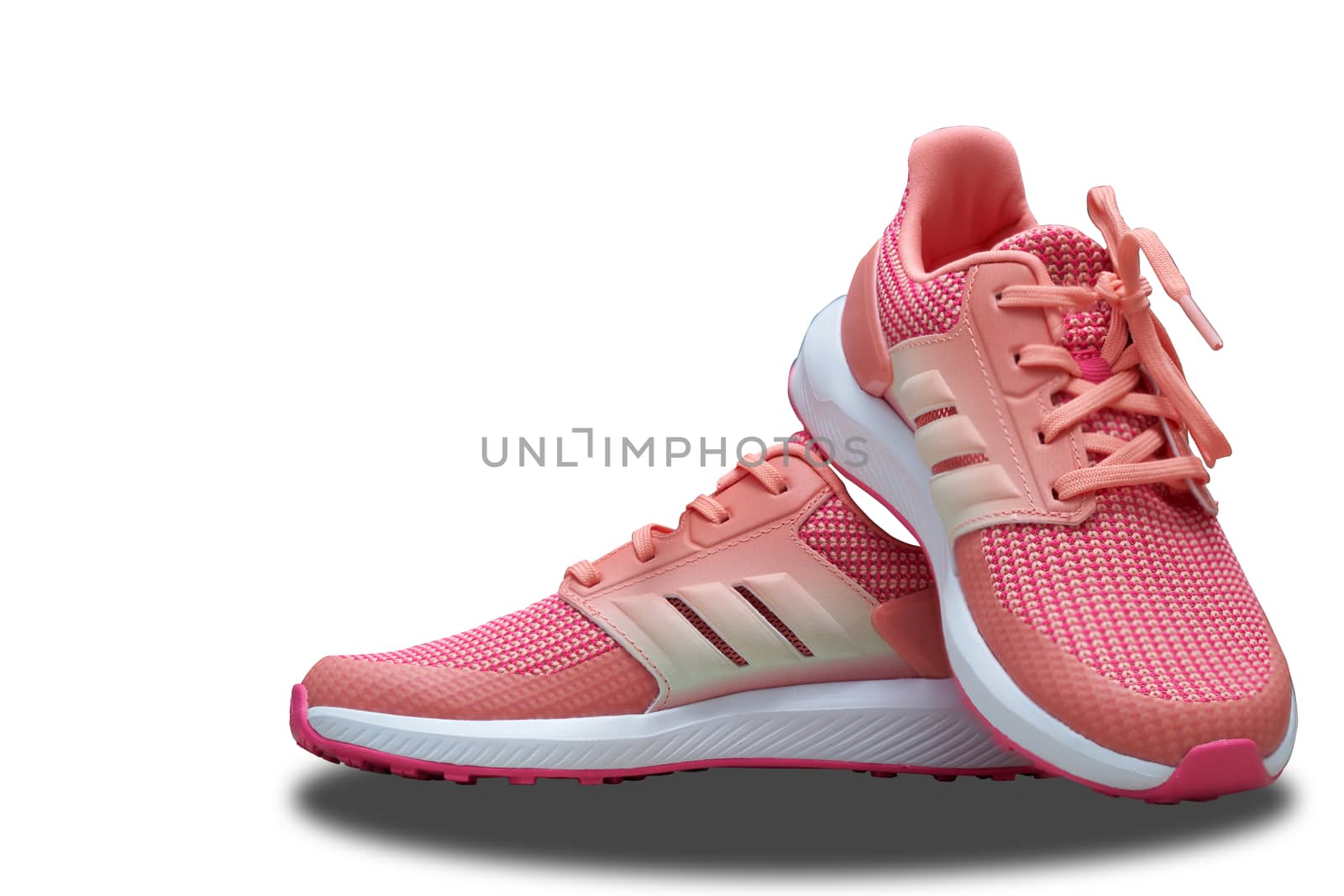 pink sport shoes on isolated white background