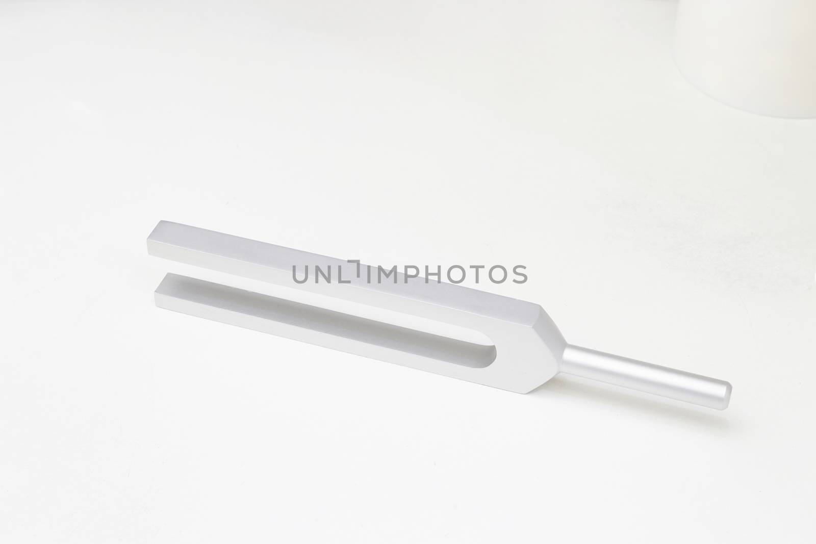 Tuning fork side arrangement on white isolated background