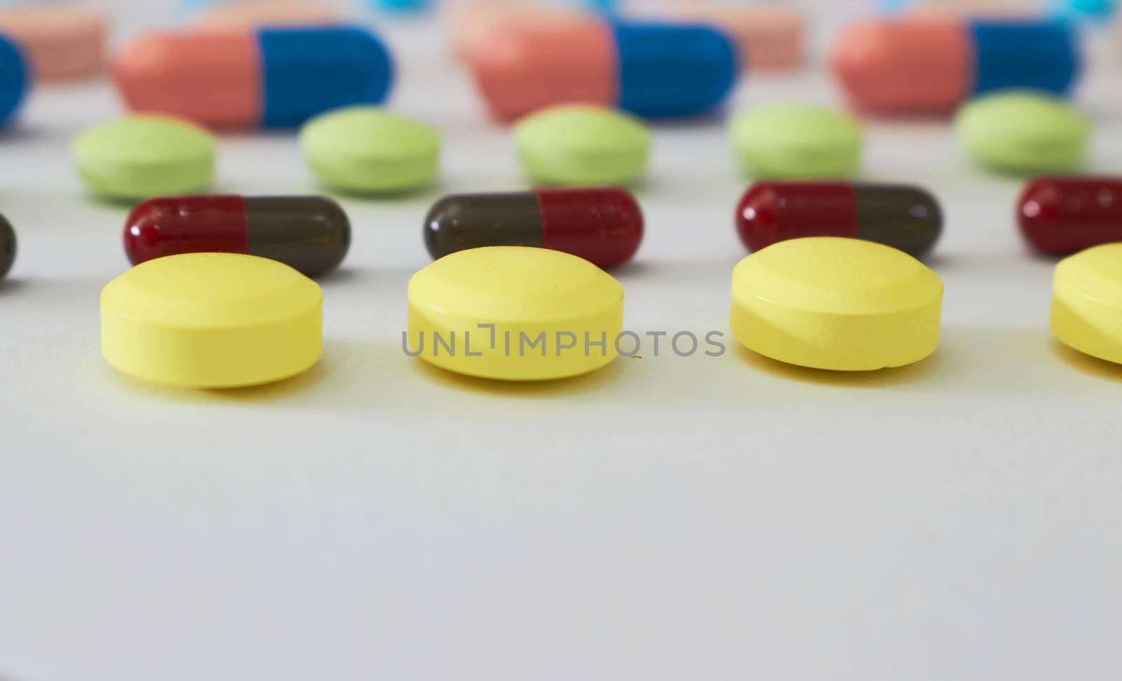 variety of kinds of drugs in lines in Medical healthcare manufacturing factory concept with copy space,closed up