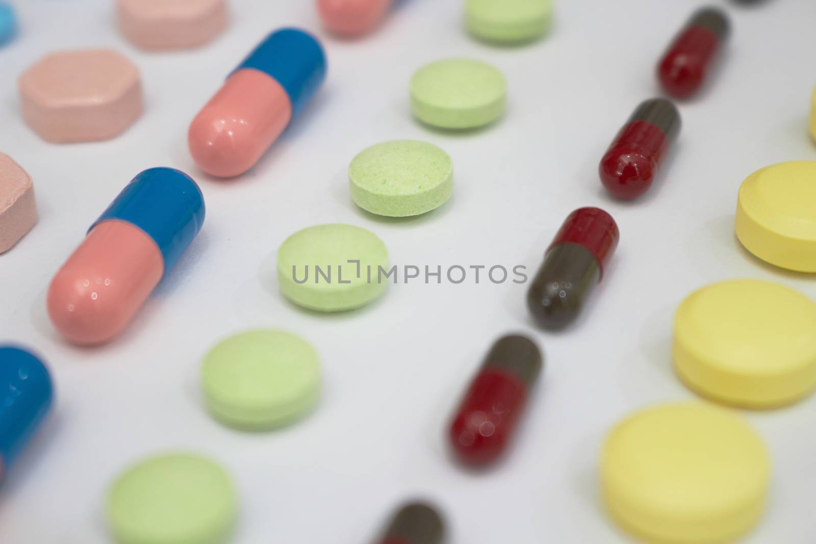 variety of kinds of drugs in lines in Medical healthcare produce manufacturing factory concept with copy space,top view