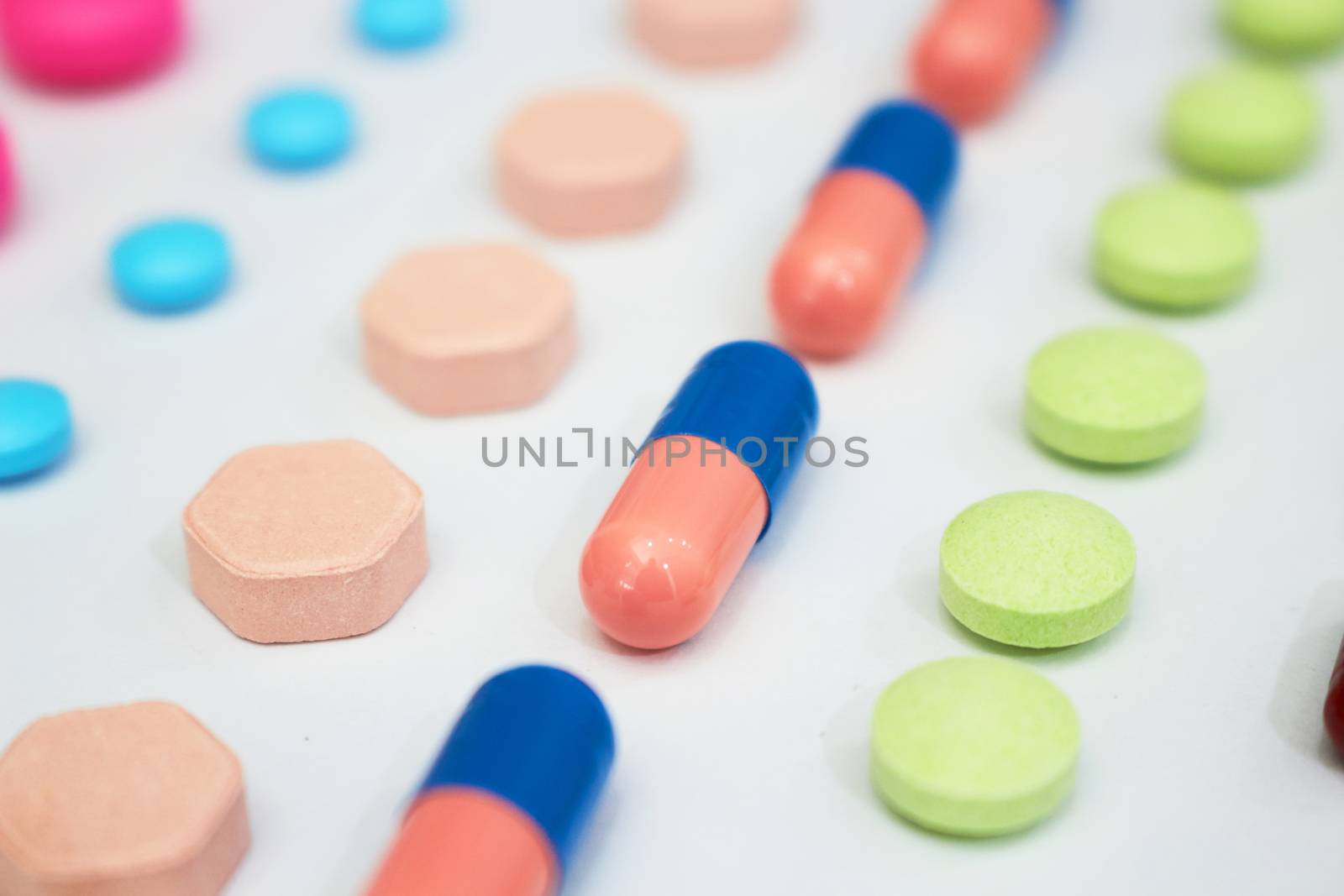 variety of kinds of drugs in lines in Medical healthcare produce manufacturing factory concept with copy space,top view