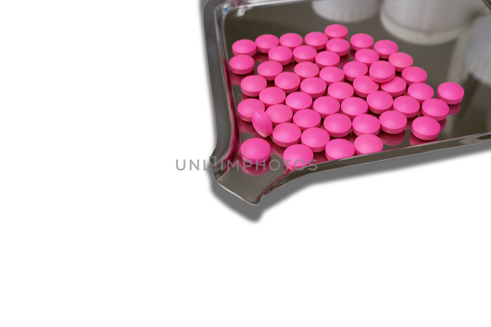 Whole pile of Pink medicine on a holder for  manufacturing concept