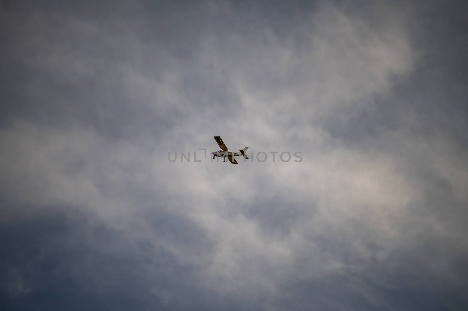 terni,italy october 19 2020:small private plane flying in the clouds