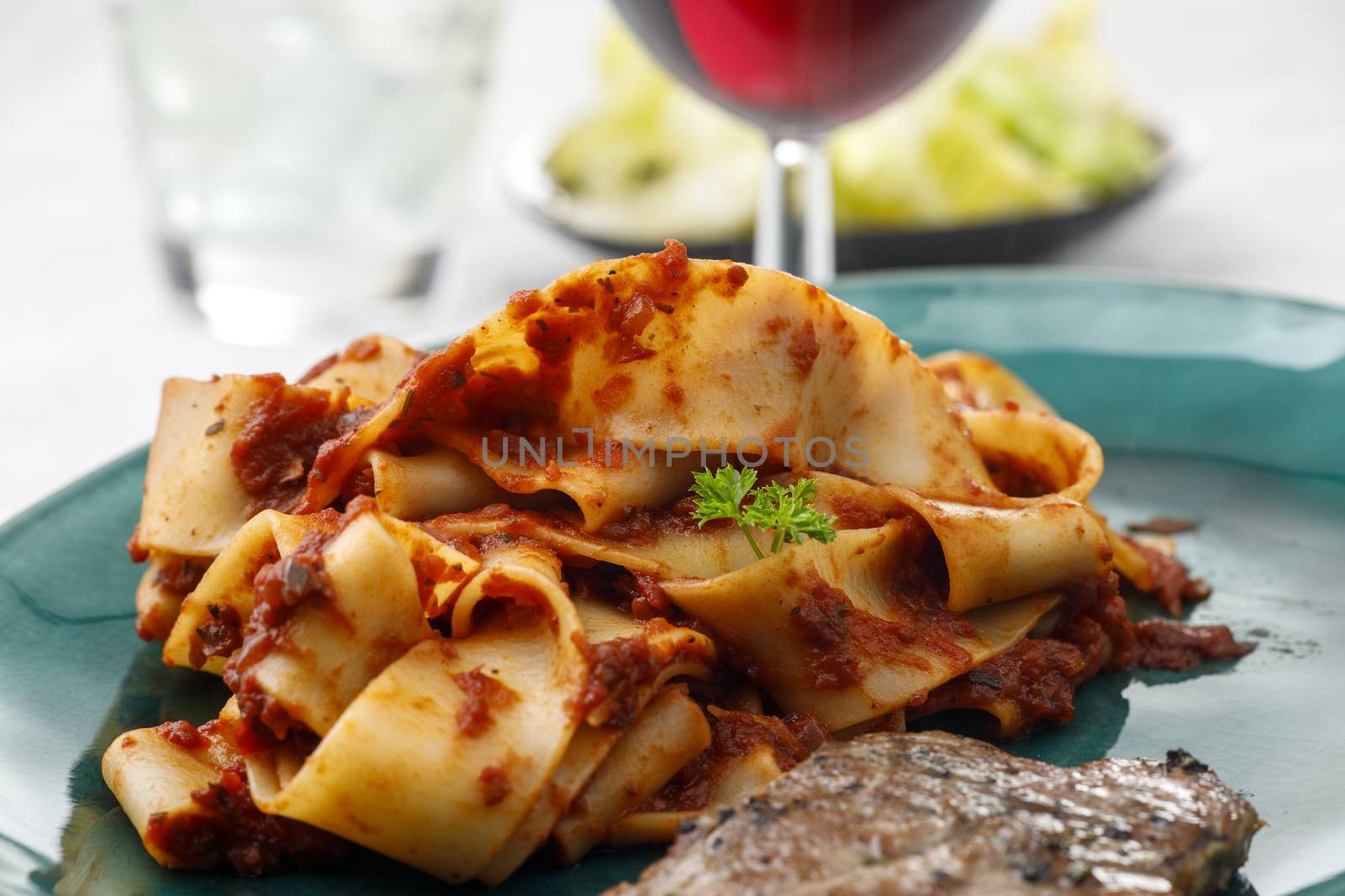 tagliatelli pasta with a steak
