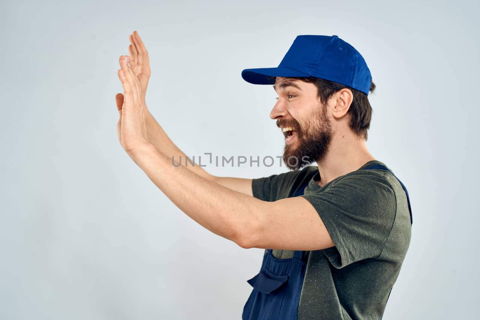 Man on working form emotions lifestyle delivery service light background by SHOTPRIME