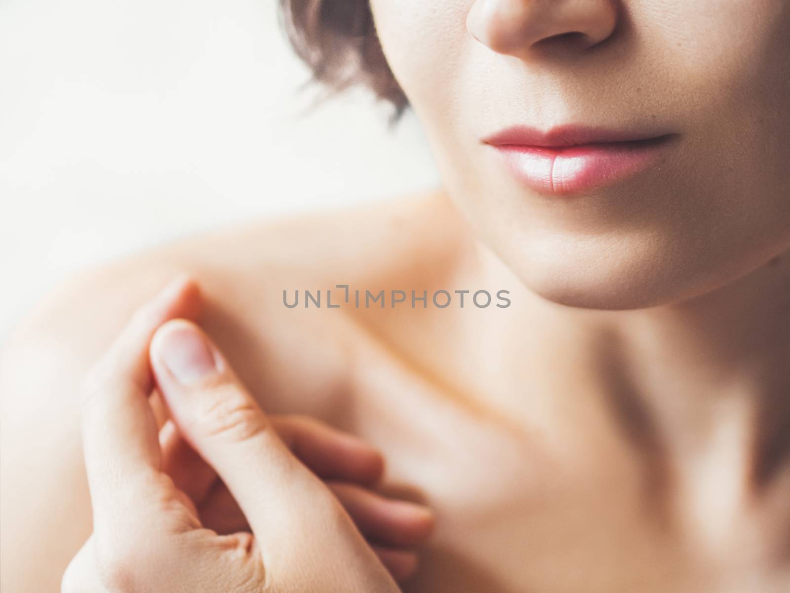 Close up portrait of woman on white background. Natural beauty w by aksenovko