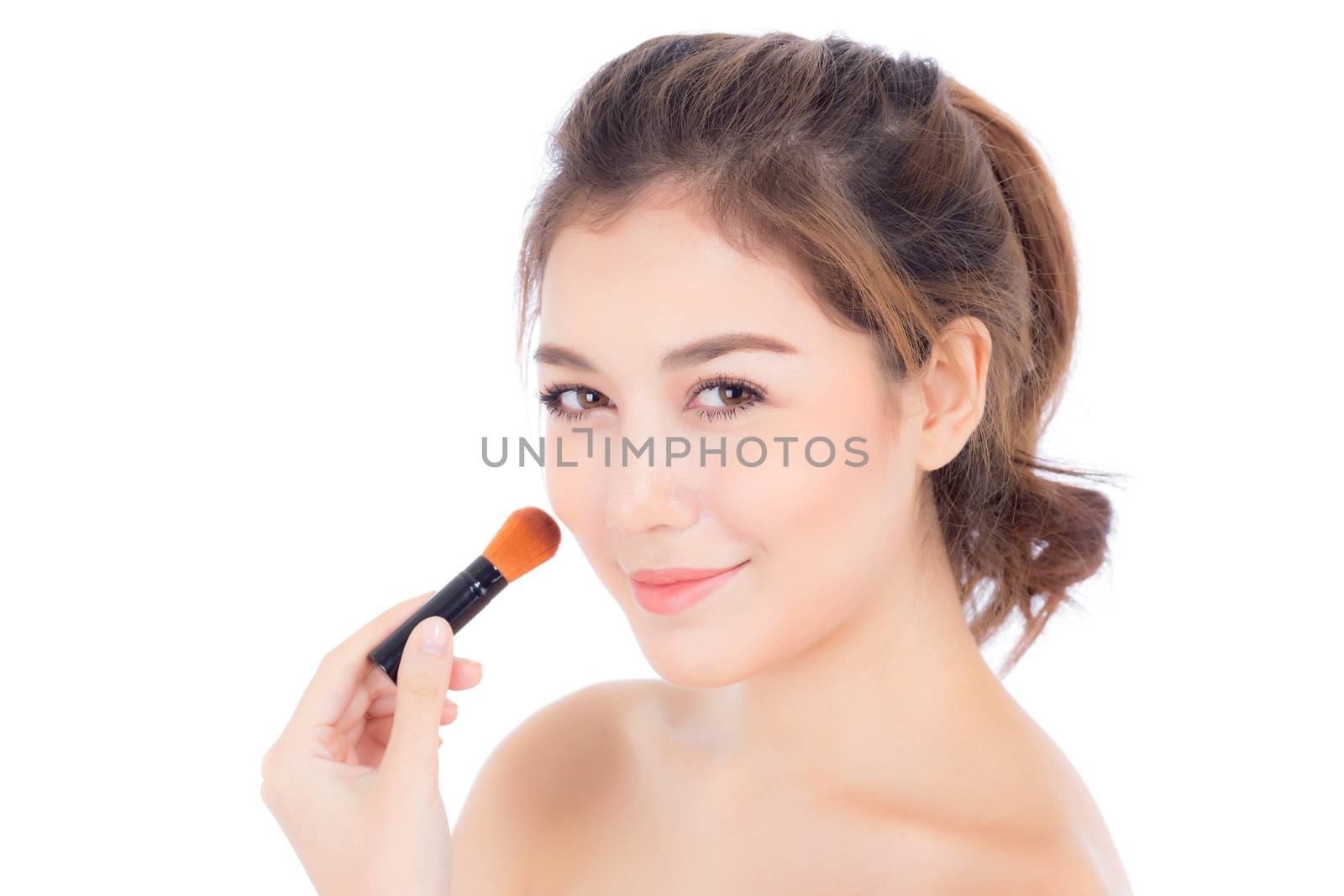 Beauty asian woman applying make up with brush of cheek isolated on white background, beautiful of girl holding blusher, skincare and cosmetic concept.