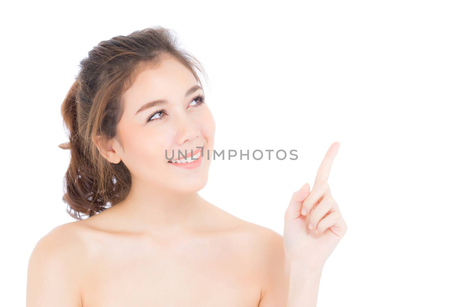 Portrait of beautiful asian woman makeup of cosmetic, beauty of girl with face smile and finger point something attractive isolated on white background, perfect with wellness and healthcare concept.