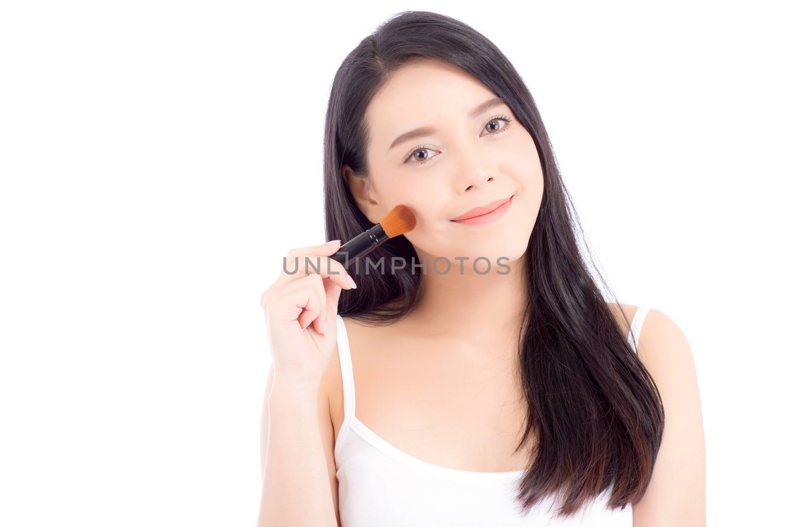Beauty asian woman applying make up with brush of cheek isolated on white background, beautiful of girl holding blusher, skincare and cosmetic concept.