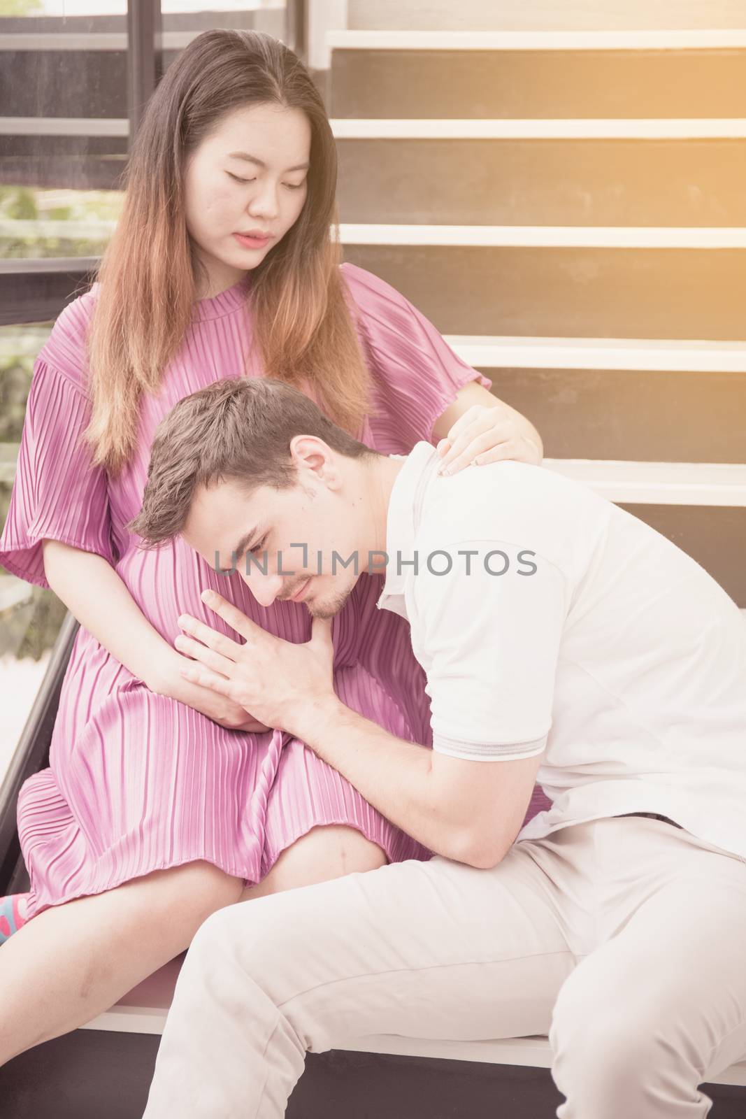 man is listen pregnant of wife, asian handsome father take care  by nnudoo