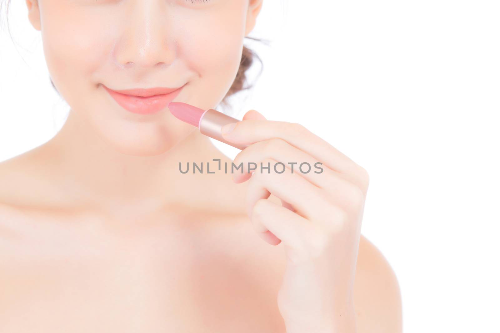 Beauty asian woman applying make up with lipstick of mouth isolated on white background, Beautiful girl on lips with happy, skincare and cosmetic concept.