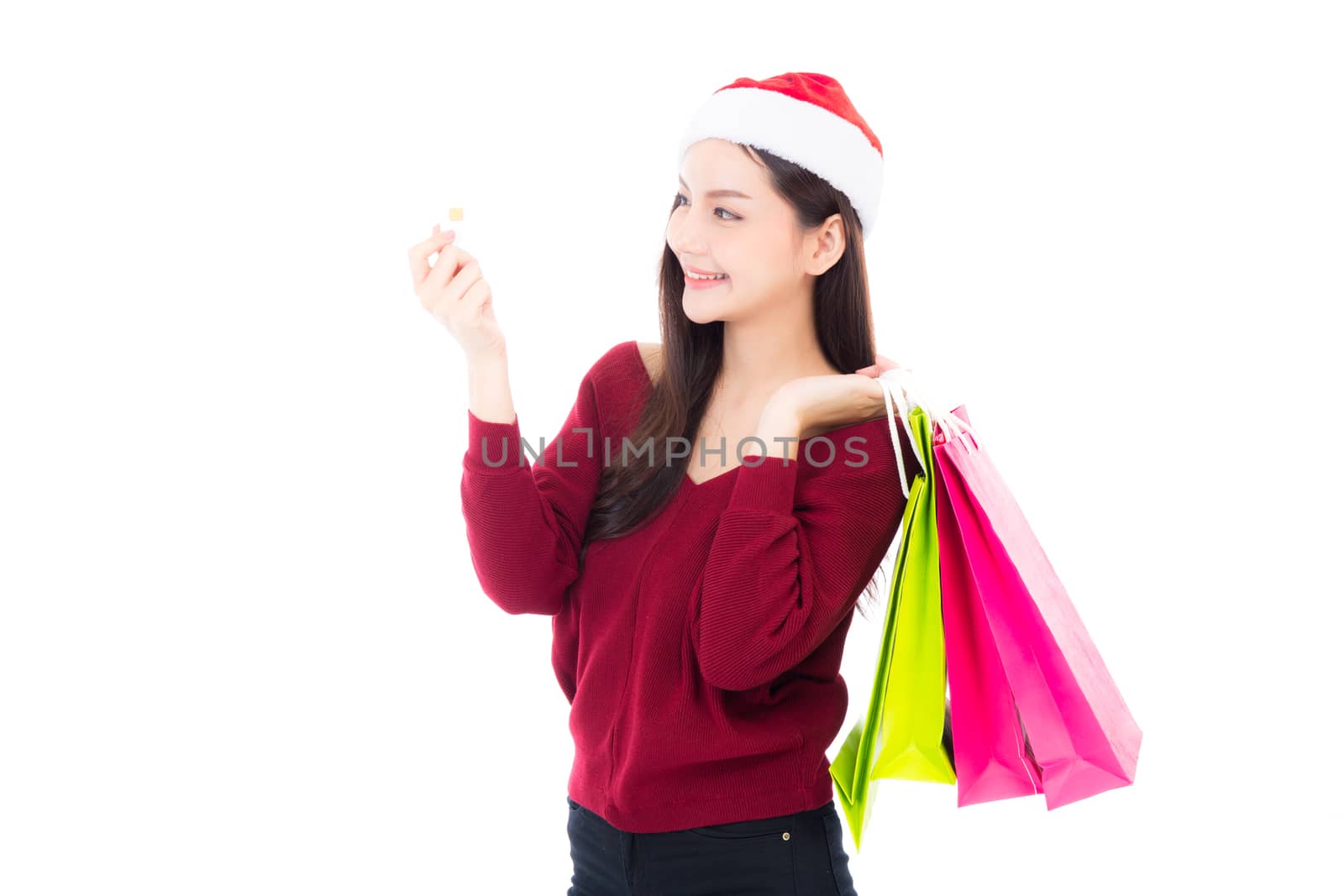 Happy fashion asian woman with smile holding shopping paper bag and credit card, Sale and christmas with holiday, girl with buyer enjoy and excited isolated on white background, season holiday concept.