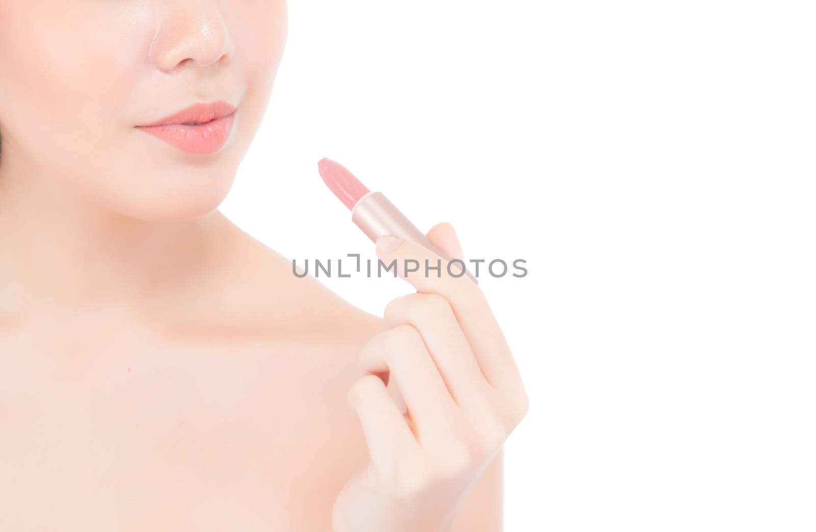 Beauty asian woman applying make up with lipstick of mouth isolated on white background, Beautiful girl on lips with happy, skincare and cosmetic concept.