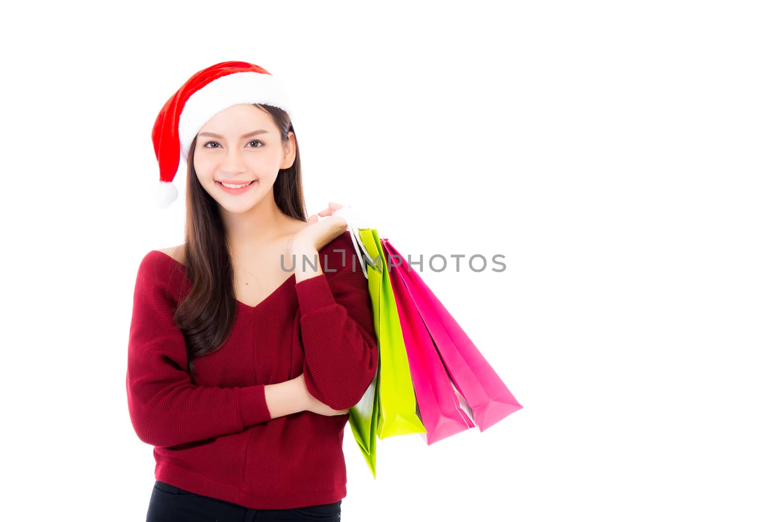Happy fashion asian woman with smile holding shopping paper bag, Sale and christmas with holiday, girl with buyer enjoy and excited isolated on white background.