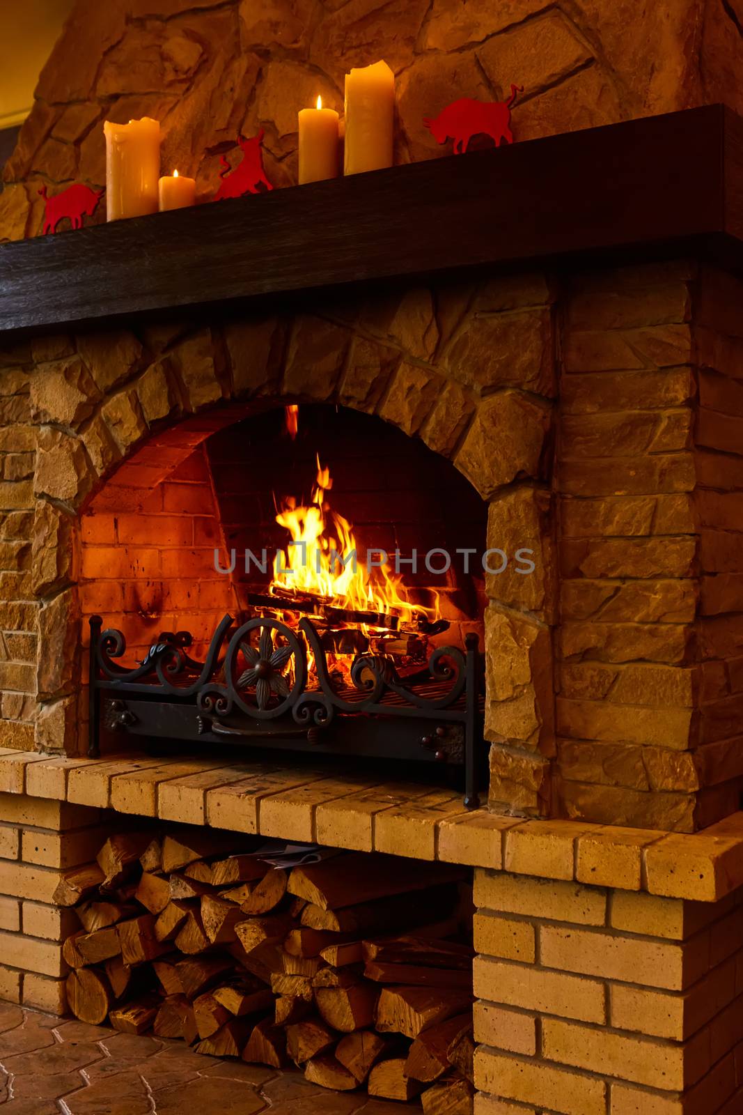 Burning fireplace. Fireplace as a piece of furniture.