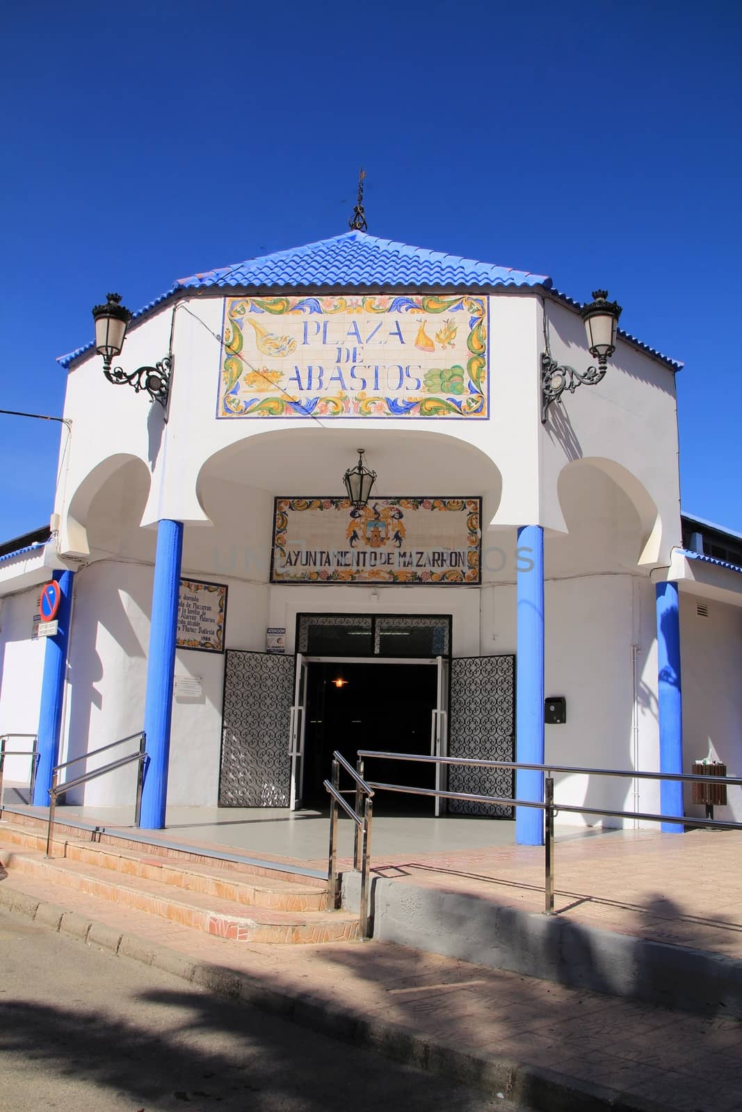 Mazarron, Murcia, Spain- October 3, 2019: Beautiful old food market painted in white and blue in Mazarron village in Murcia