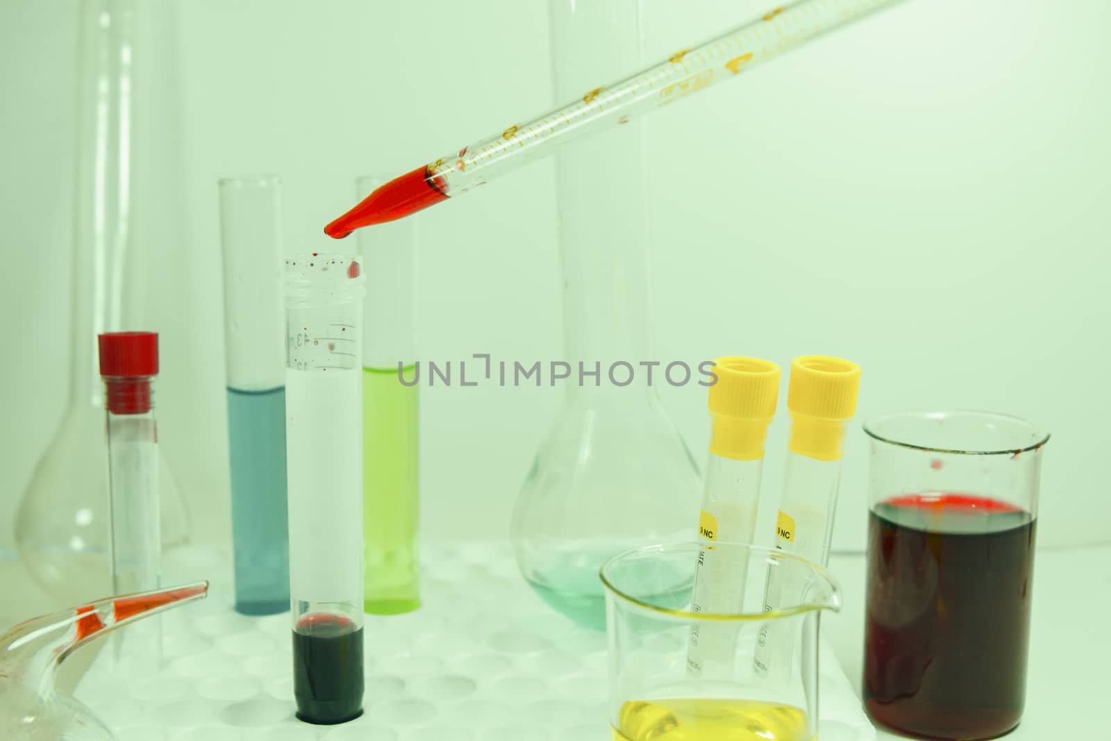 Chemical laboratory instruments, glassware and pipette. Tests and research diagnoses in lab.