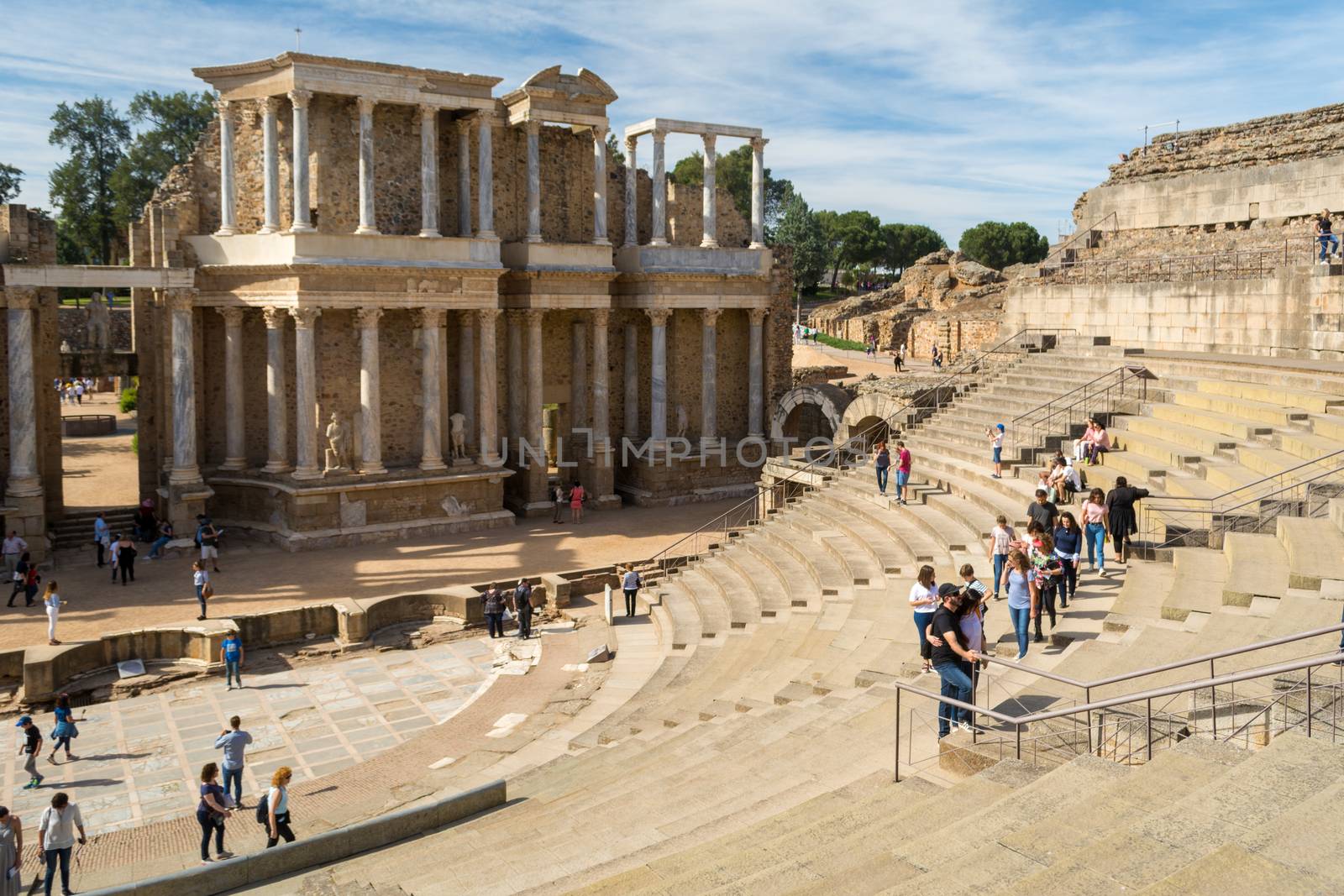 Merida, Spain, April 2017, tourists visiting the Roman ruins theatre arena & waiting rooms used for gladiator & animal fights. Travel and tourism.