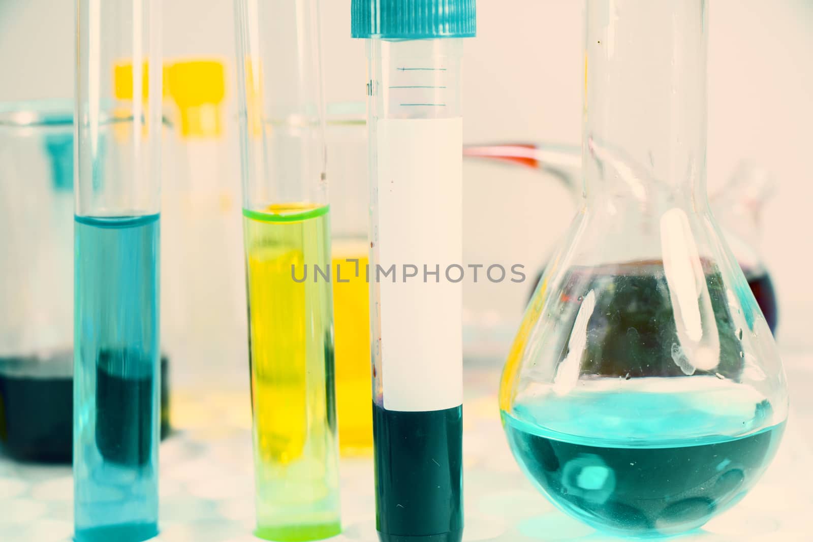 Blood test tube sample without name, empty space for text, laboratory background by Taidundua