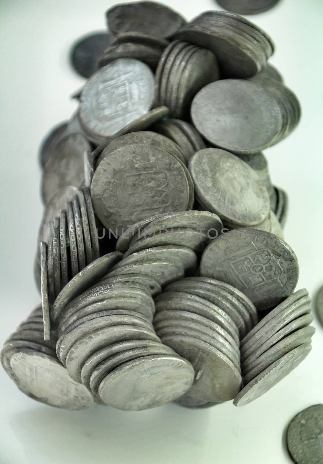 Cartagena, Murcia, Spain- July 25, 2019: Spanish silver coins recovered from the ocean floor by the Odissey company and exposed in underwater museum in Cartagena, Spain