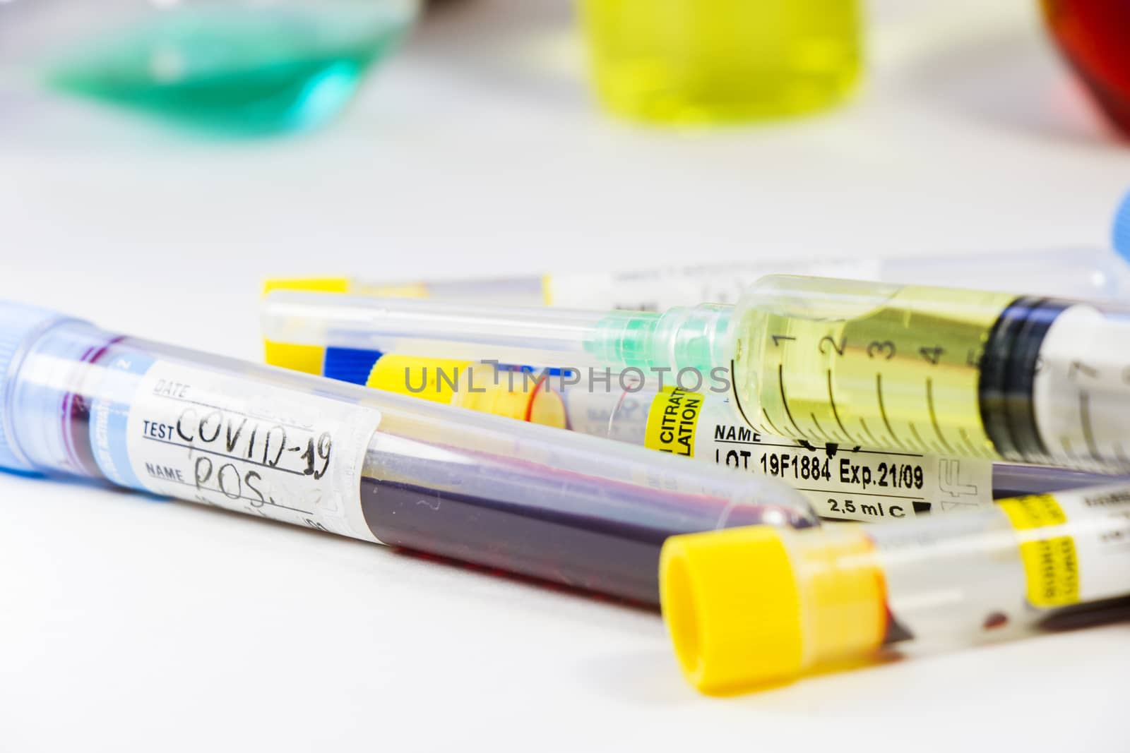 Corona virus, NCOV and Covid - 19 positive test samples. Medical needle corona virus or covid-19 vaccine. by Taidundua