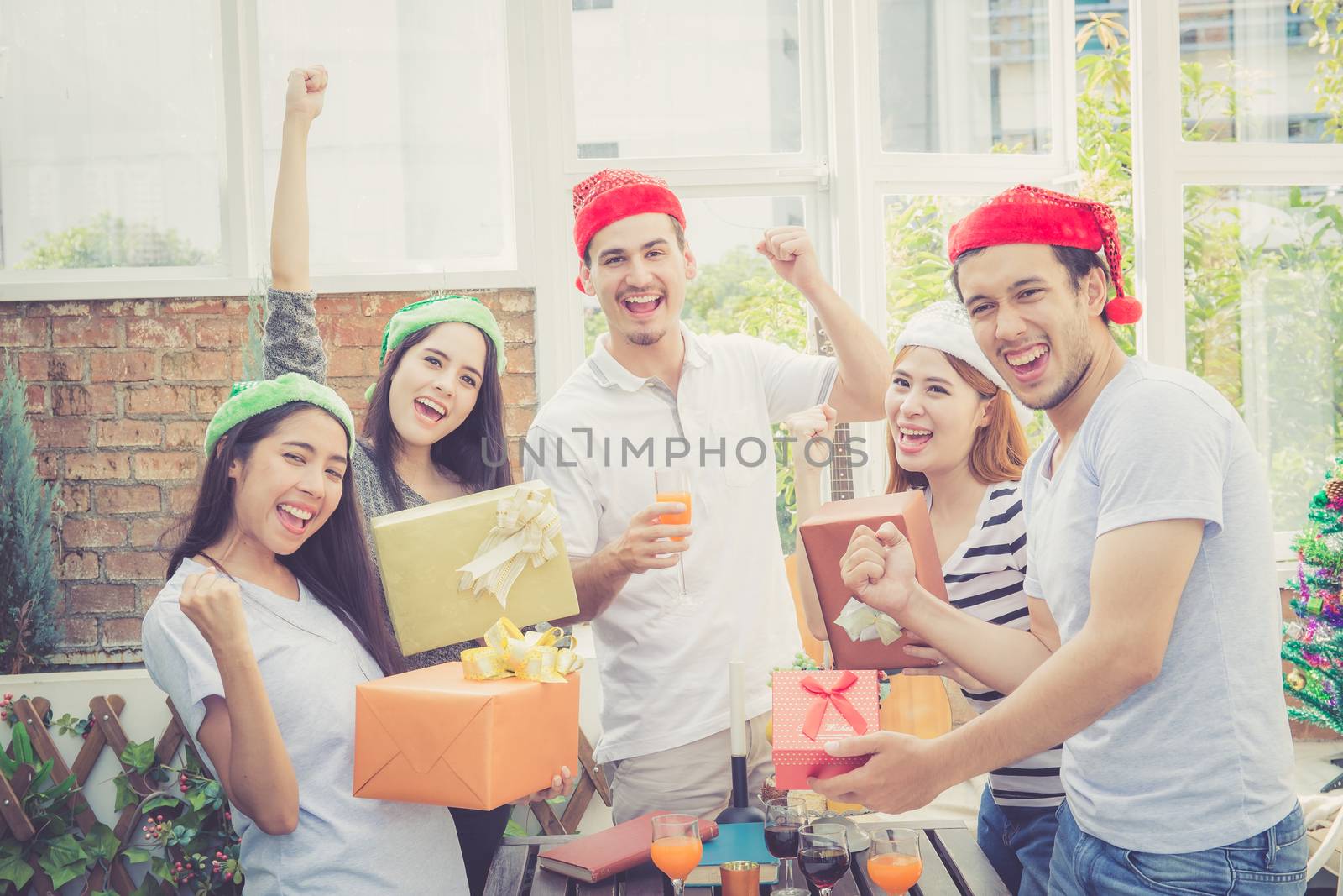 Asian group people man and woman giving gift box and celebration by nnudoo