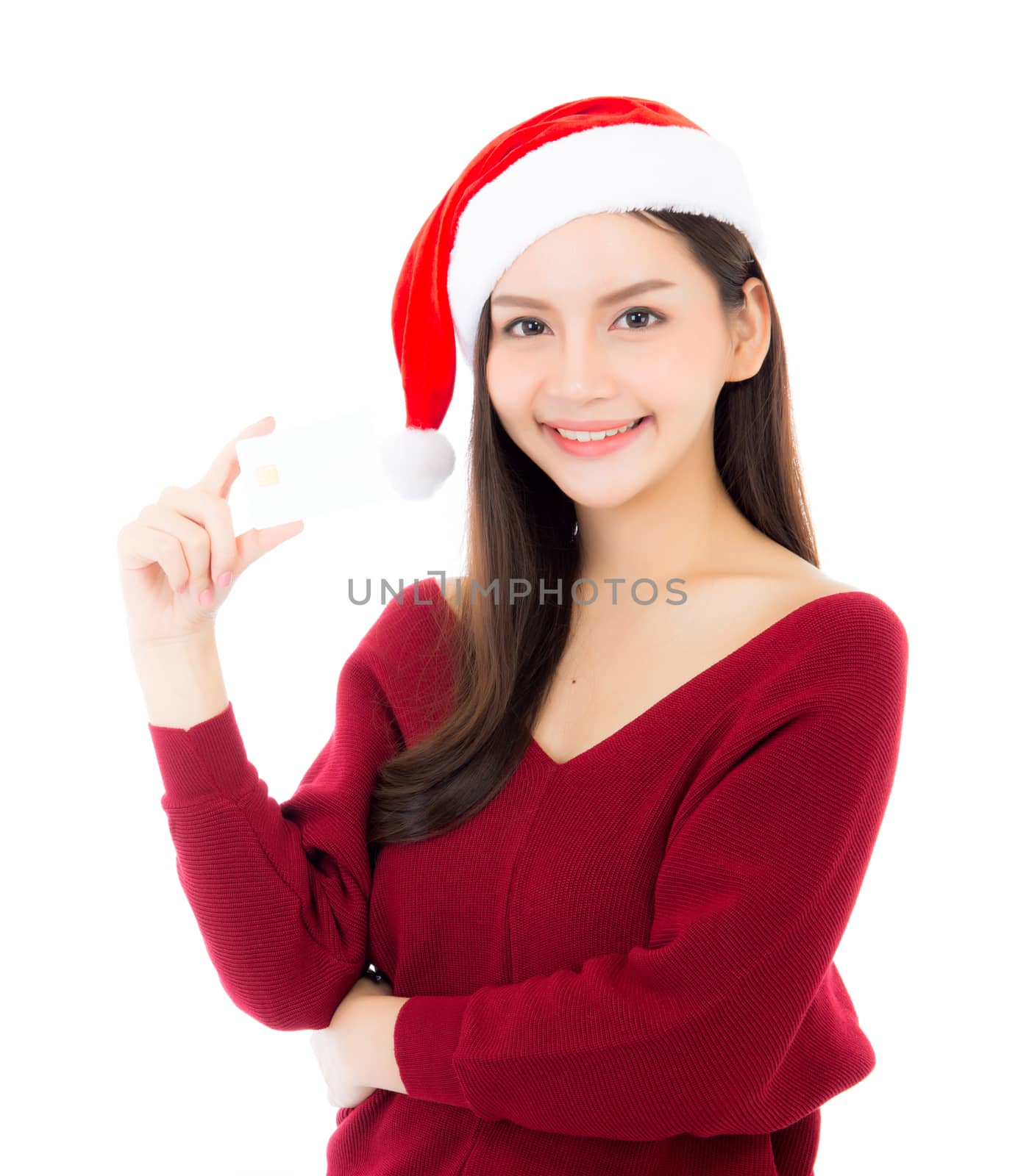 Portrait of beautiful asian young woman in santa hat smile holding credit card, girl have happy with shopping isolated on white background, christmas and holiday concept.